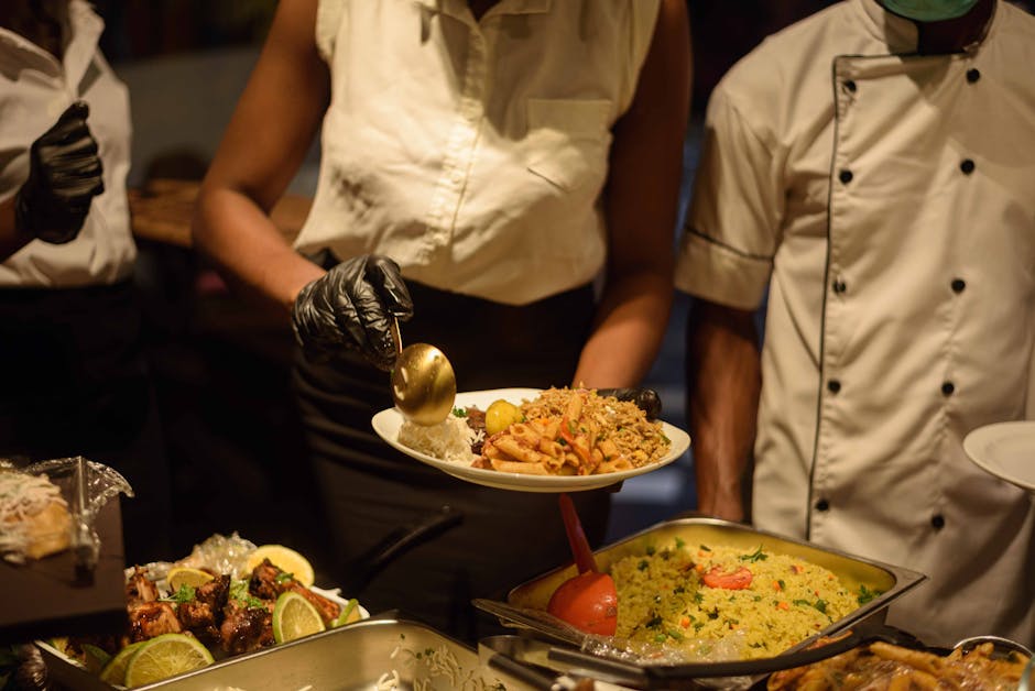 Professional catering staff serving guests at a high-end event